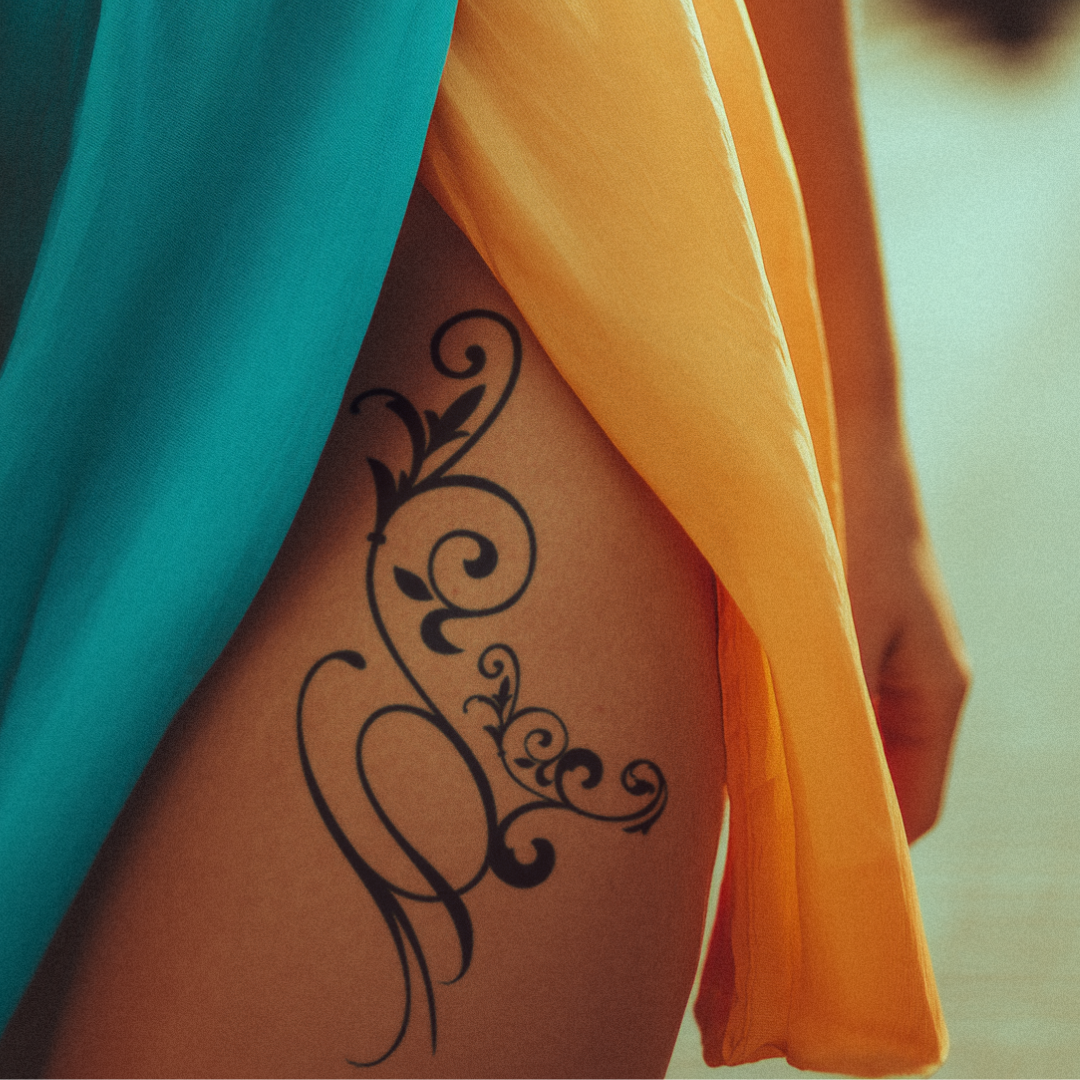 Elegant Vine Tattoo