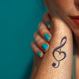 Herz Notenschlüssel Tattoo