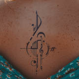 Abstrakter Notenschlüssel Tattoo