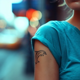 Joyful Dolphin Tattoo